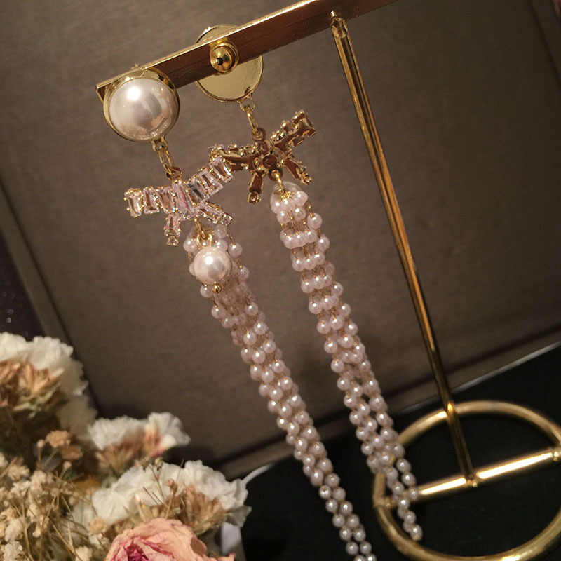 Fashion Pearl Bowknot Long Tassel Earrings display picture 1