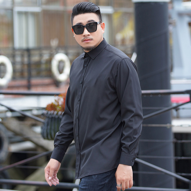 卸売りの現物の大きいサイズの男性服のカジュアルなシャツの夏の男性のビジネスはゆったりしていて、大きいサイズの純色の長袖のシャツをプラスします。|undefined