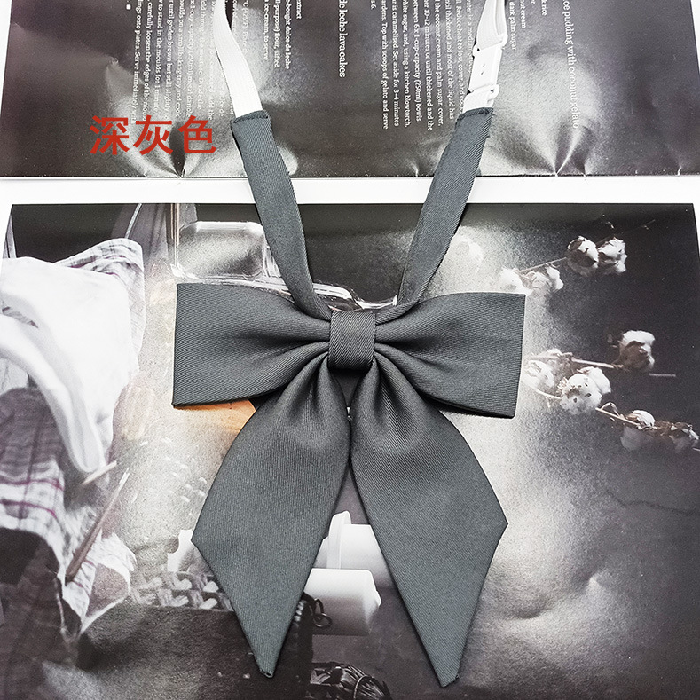 Spot al por mayor versión estrecha niña pequeña pajarita de raíz de plumas pajarita flor moda nuevo lazo color sólido jk pajarita satinado