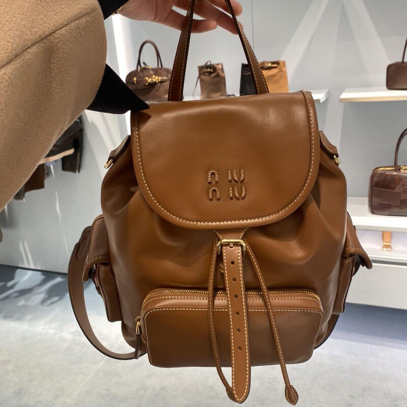 2025 New Miu Genuine Leather Backpack Niche Design Versatile Retro Large Capacity Double Drawstring Drawstring Backpack