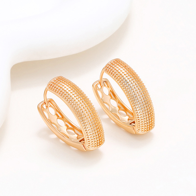 Xuping joyas europeas y estadounidenses en forma de U pendientes franceses femeninos simple moda fría pendientes de aleación de oro al por mayor