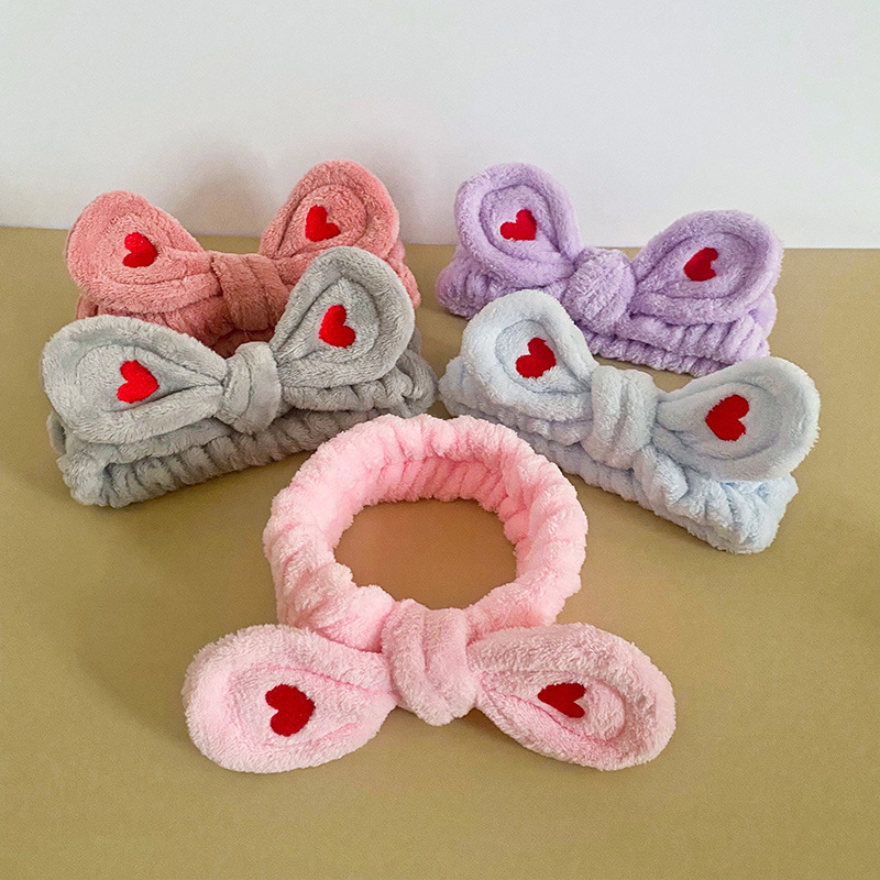 Celebridad en línea estilo coreano bordado pequeño corazón arco banda para el cabello deportes de las mujeres yoga pañuelo cara lavado banda para el cabello accesorios para el cabello al por mayor