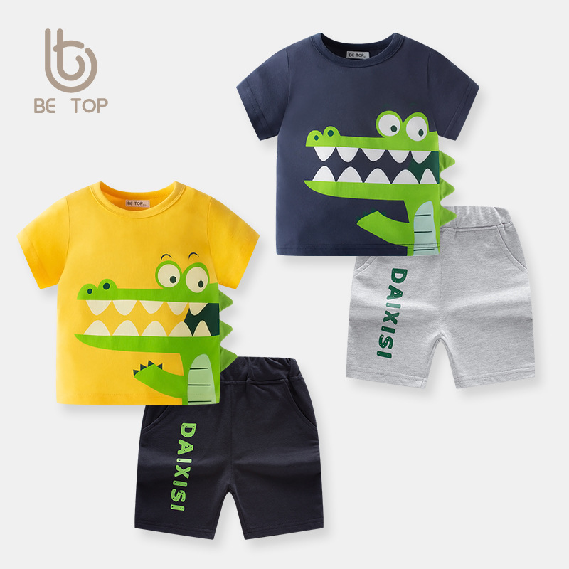 Ropa infantil verano 2026, nuevo conjunto de verano estilo coreano, conjunto de dos piezas con diseño de dinosaurio 3D para niños, conjunto moderno para niños, venta al por mayor