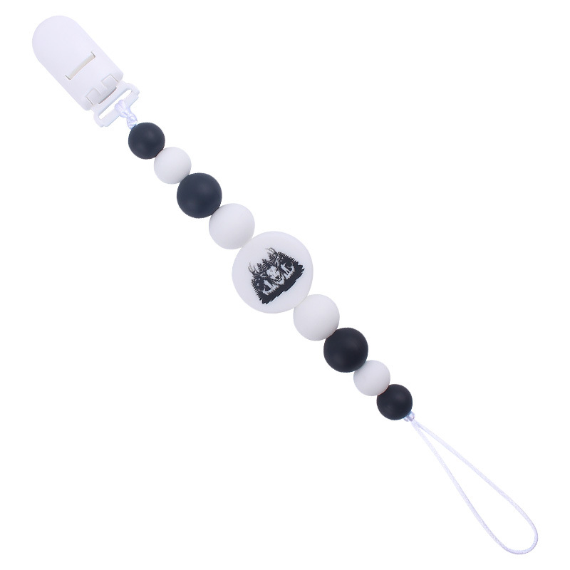 Nuevo bebé suministros de dibujos animados de impresión redonda amor creativo DIY silicona mordedura molar pezón cadena anti-caída