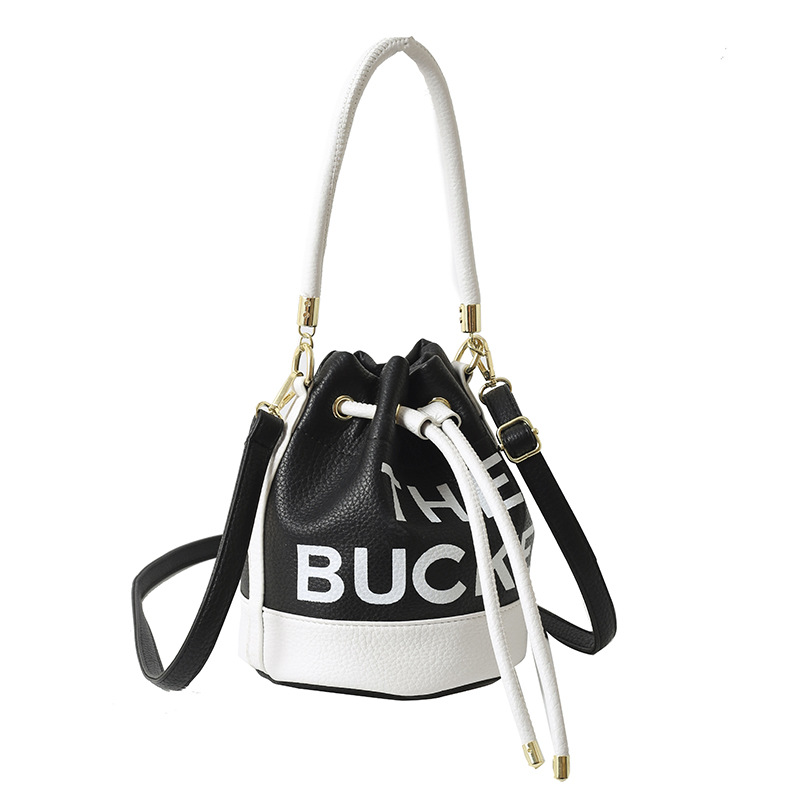 Bolso de hombro femenino casual todo-fósforo diseño de nicho sentido contraste color costuras cubo bolso de mano moda tendencia bandolera