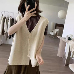不規則なニットの馬は女性の春秋の新型のゆったりしていて、やせているvネックのシンプルな大衆のデザイン感のウールのベストを現します。