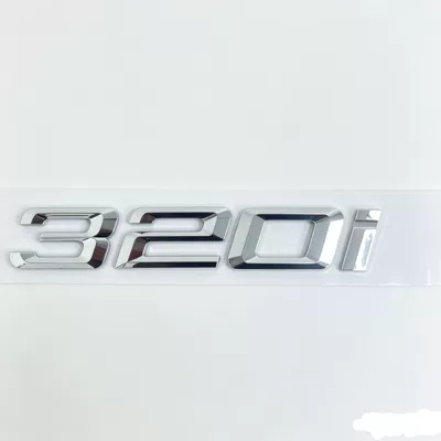 Car logo with displacement numbers of older - older-model-bmw-320i-electroplating