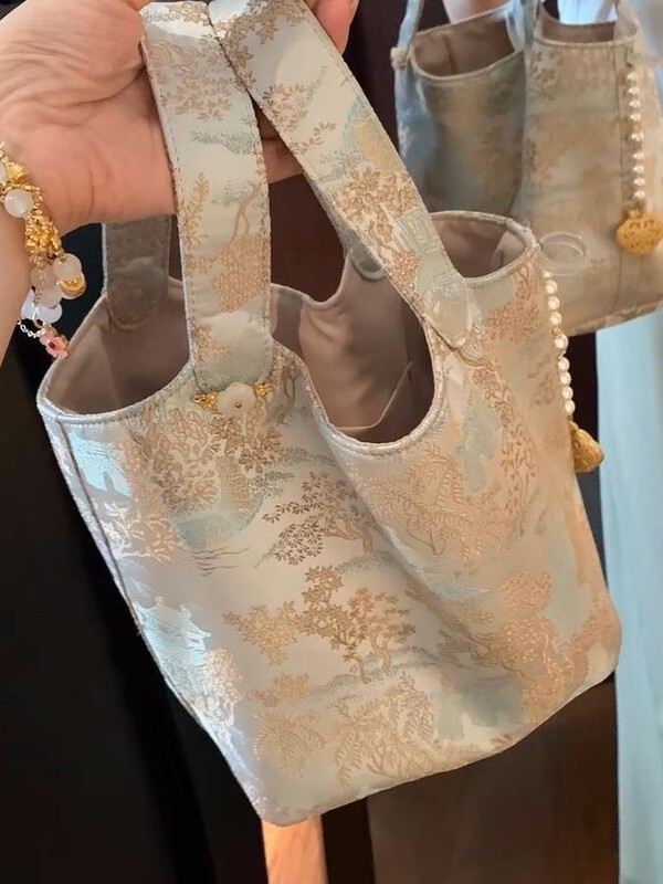 女性のための新しい中国風の脇の下バッグ 2024 夏刺繍ニッチハイエンドシングルショルダーハンドバッグ|undefined
