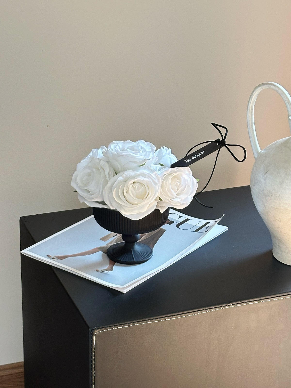 White hand-held + low vase