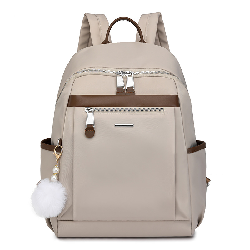 Mochila de nailon para mujer 2024 nueva moda salvaje para mujer mochila para desplazamientos urbanos mochila de gran capacidad al por mayor