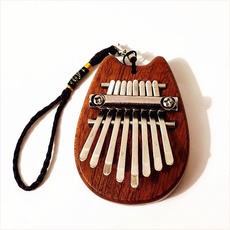 Mini 8-Note Thumb Piano Kalimba Thumb Piano Palm-Sized Ultra Compact Portable Cute Viral Hollow Thumb Piano 8 Notes