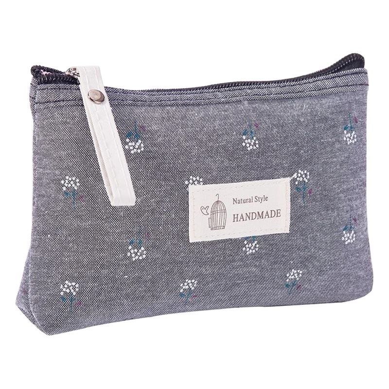 Japonés y coreano lienzo impermeable bolsa de cosméticos portátil de las mujeres ins estilo flor gran capacidad chica lápiz bolsa de almacenamiento bolsa de lavado