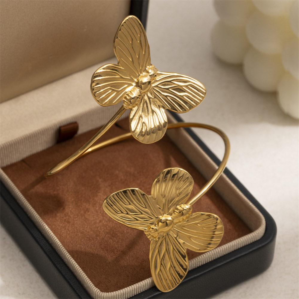Tena pulsera de acero inoxidable europea y americana para mujer, anillo de mariposa de alta calidad, pulsera de acero de titanio de nicho, joyería de explosión transfronteriza para mujer