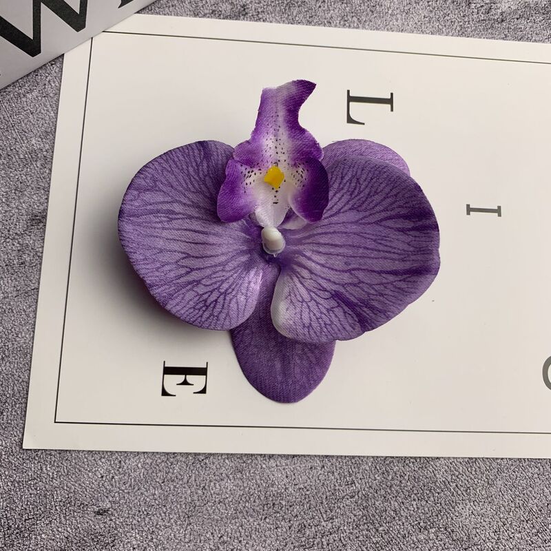 絹布の胡蝶蘭の花の頭は花の壁の部品の花の材料の頭をシミュレーションして髪を飾ってdiyの手作りの結婚祝いの贈り物を挟んで造花を飾ります。|undefined