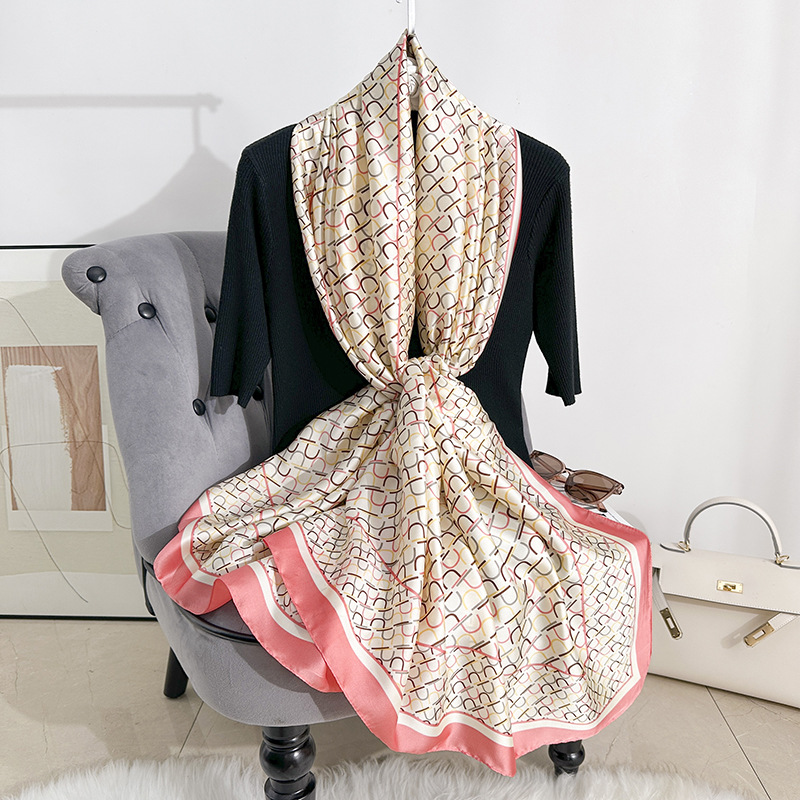 Pañuelo de seda estampado de temperamento elegante para mujer, protector solar de playa de alta gama, nueva bufanda de satén de seda, chal de habitación con aire acondicionado fino de verano