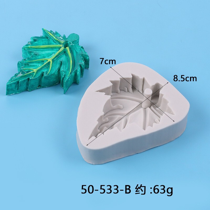 いくつかの草の葉のカエデの葉の形の液体のシリカゲルの鋳型のdiyはあめのケーキの石膏をひっくり返してゴムの鋳型を垂らします。|undefined