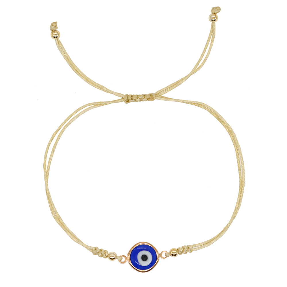 Pulseira de berloques olho grego com contas douradas_voghion.com
