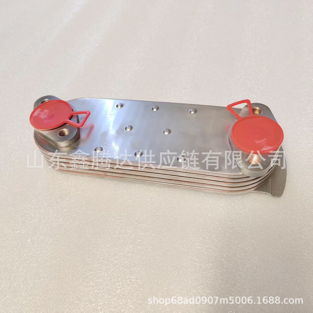 Factory Direct Supply of Engine Oil Cooler for Japanese Cars, Auto Parts Ok55114701 with 5-Layer Water Deflector