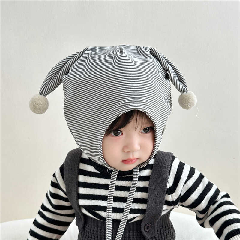 Bebé otoño y invierno gorras de orejas para bebés de hombres y mujeres lindos gorras de algodón caliente gorras de pelota para bebés super lindos