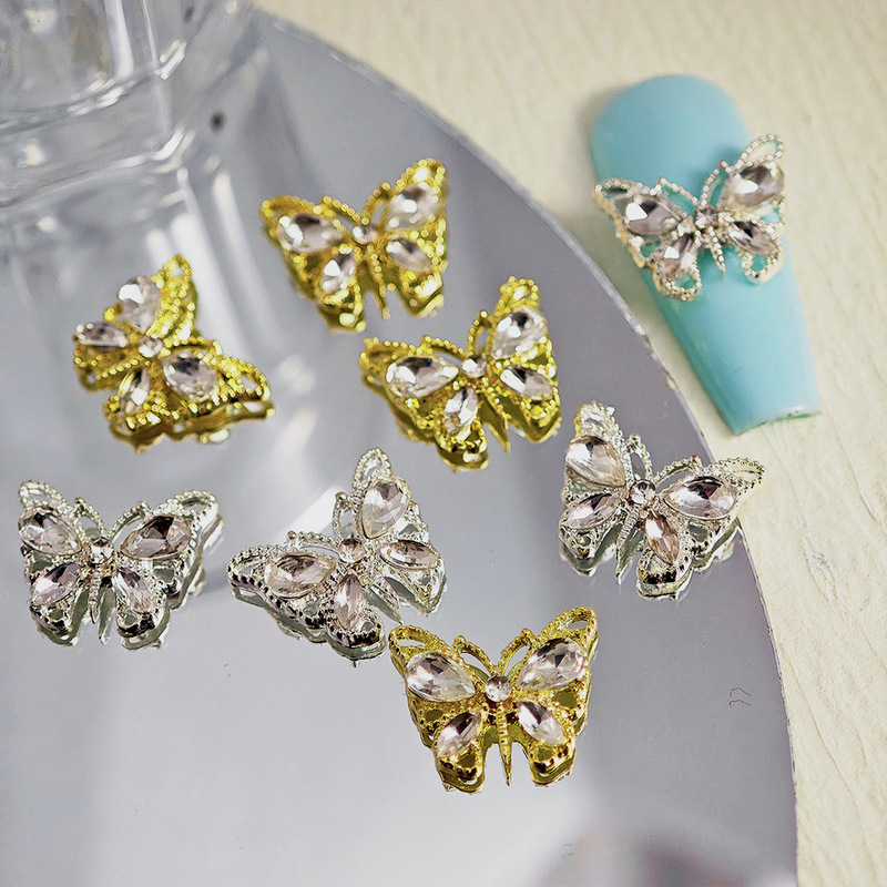 義烏のネイルは精巧で液体の蝶のアクセサリの合金の金属の立体はジルコンの蝶のドリルの透かし彫りの爪の装飾をまねます。|undefined