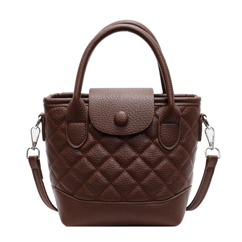 Lingerie bolso de cubo de mano para mujeres 2025 nuevo estilo coreano simple bolso de hombro de alta sensación versátil bolso de mochila de moda