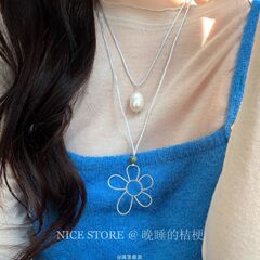 夜寝るキキョウ「晴日風」韓系気質風銀色の花がネックレスのセーターチェーンを重ねて鎖鎖にぶら下がっている