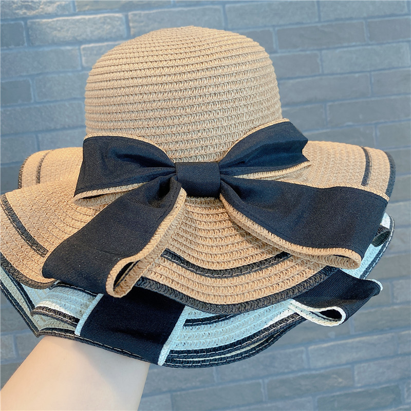 Women's Simple Style Bow Knot Big Eaves Straw Hat display picture 7