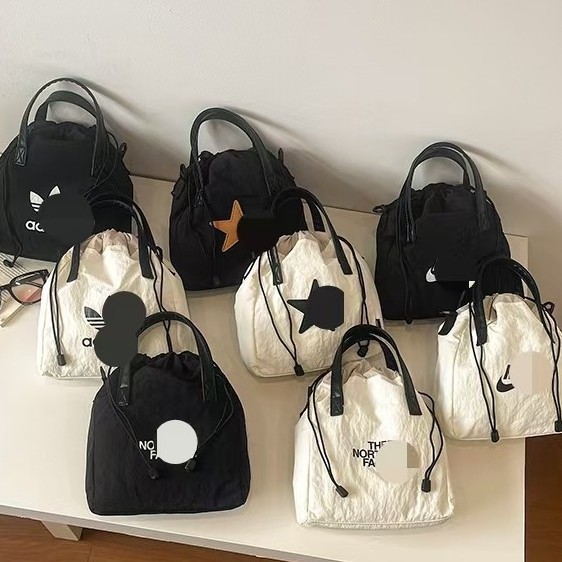 Women's Korean-style new letter-printed nylon shoulder bag, casual versatile portable drawstring large-capacity tote bag