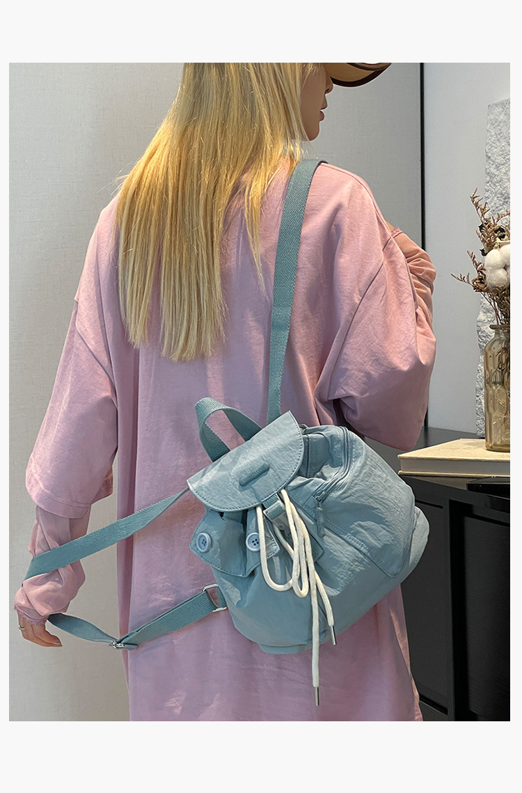 Colorful Fox's new Korean-style ins women's niche design lightweight pocket button drawstring backpack undefined