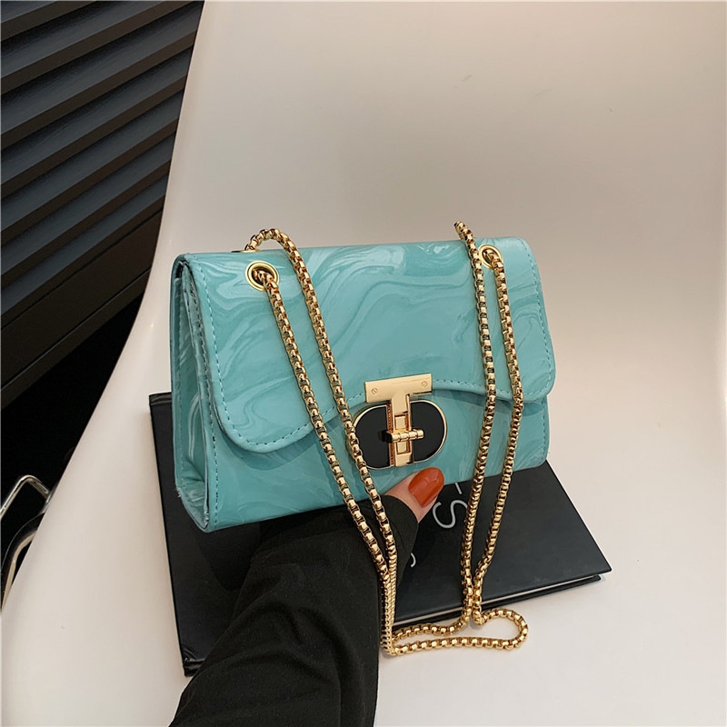 Nicho bolso de diseño bolso de mujer nuevo estilo de moda de marea de viento de bloqueo de hombro mochila de textura de cadena pequeña bolsa cuadrada de moda