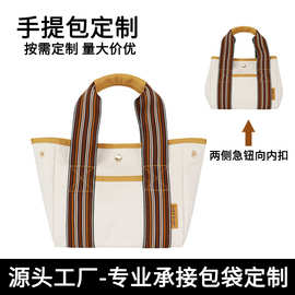斜纹水洗棉手提帆布包小众高级感斜挎包搭扣两用水桶包时尚小拎包
