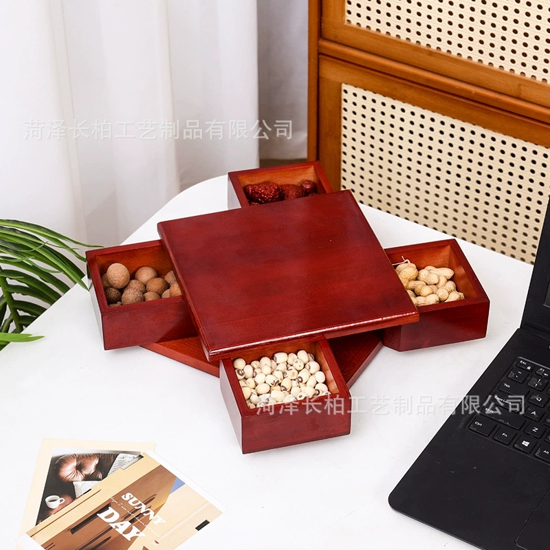 [Nut and snack storage box, a rotating compartmented box with]