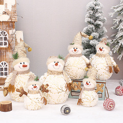 クリスマスの装飾用品の長い毛のプリントの尖った帽子の雪だるまの公仔のクリスマスのプレゼントの新商品の置物
