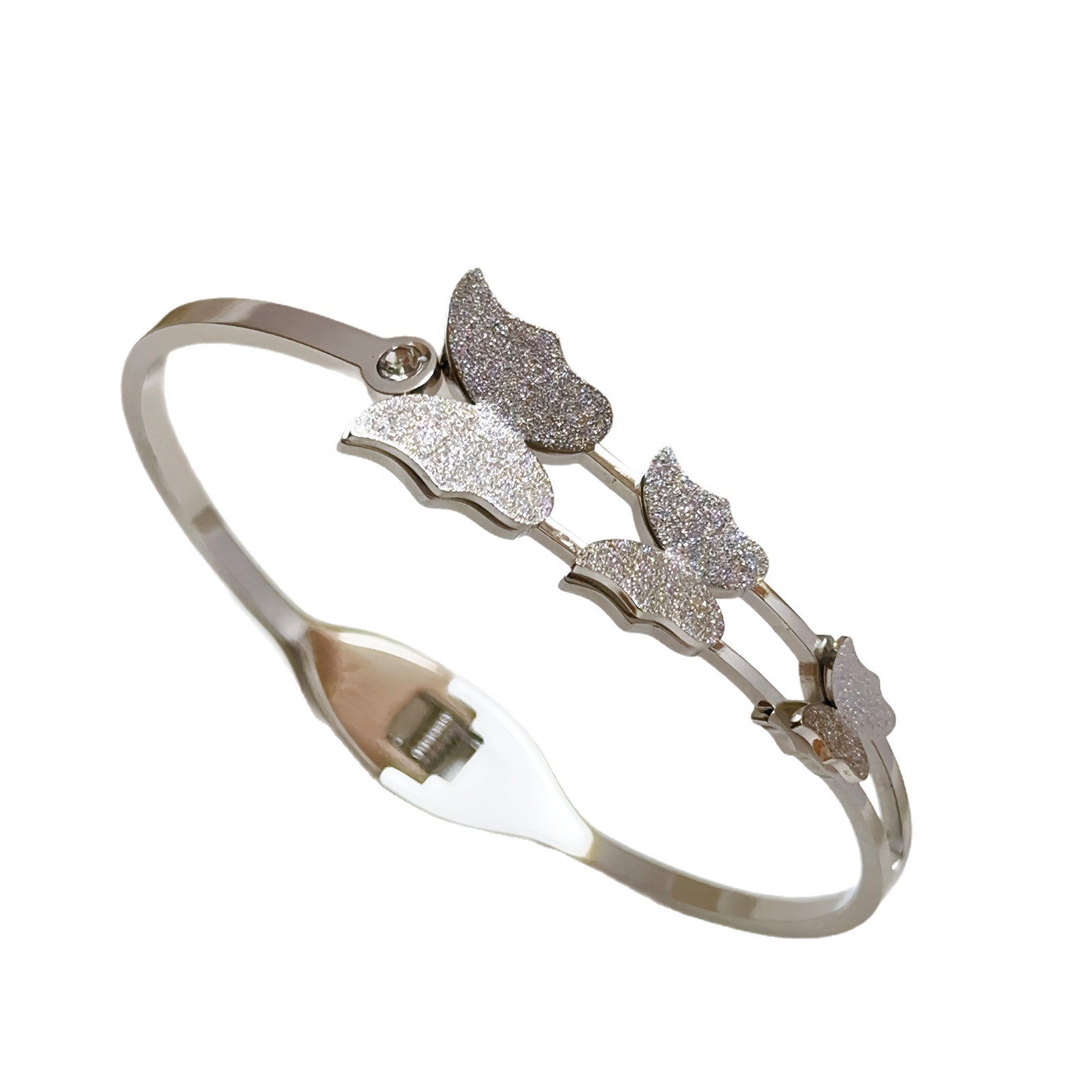Brazalete de acero de titanio de moda femenina, brazalete de mariposa abierta, pulsera de resorte esmerizada, joyas de estilo europeo y americano, sensación de alta calidad