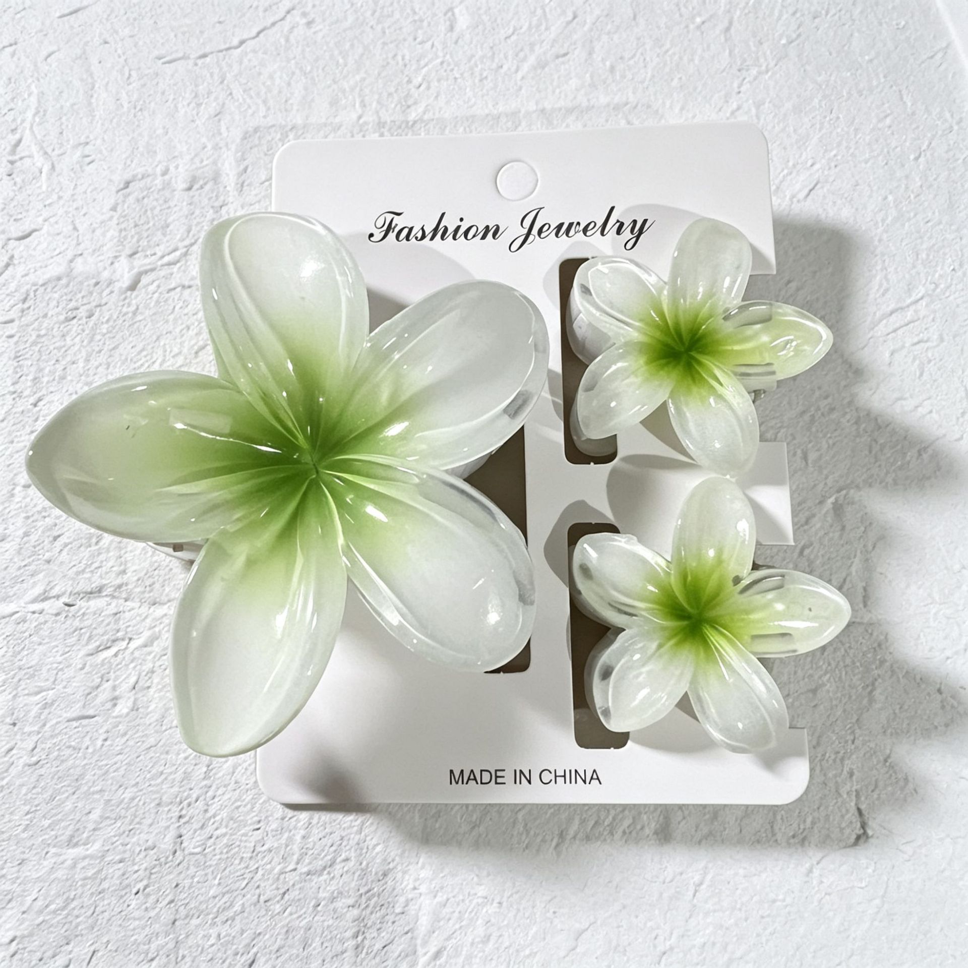Ventas transfronterizas calientes nuevos huevos láser de dos colores clip de agarramiento de flores de cabeza posterior clip de tiburón clip de cabello joyerías para el cabello