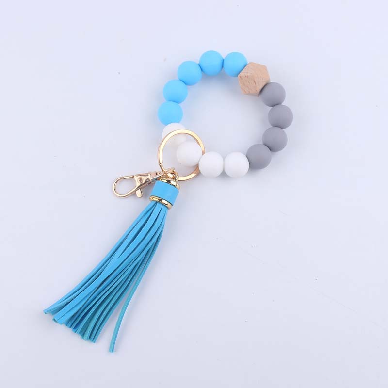 Pulsera de silicona pulsera llavero nuevo creativo DIY borla colgante contraste color
