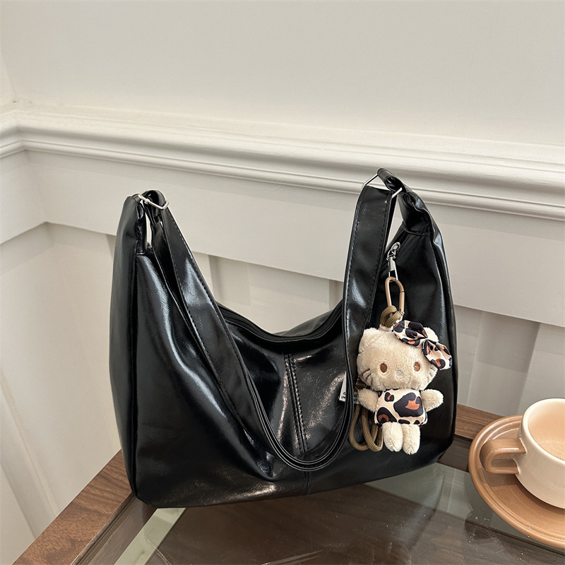 Bolsos de brazo de nicho coreano para mujeres invierno 2024 nuevo bolso retrógrado de gran capacidad, bolso de moda versátil.