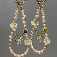 复古美拉德虎眼石香槟珍珠手机链高端轻奢手机挂饰小众包挂件挂链