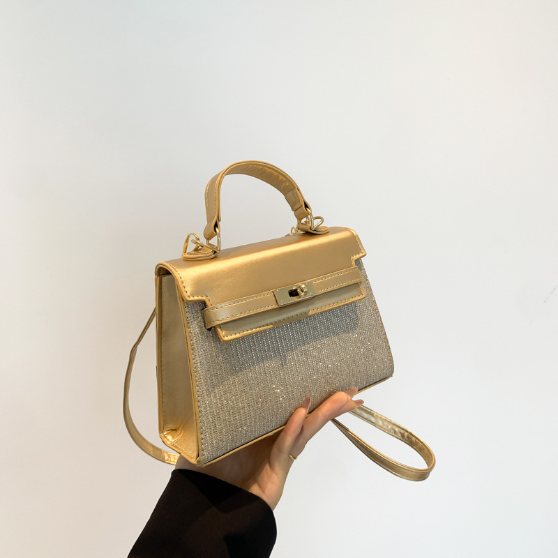 Bolsa pequeña de estilo extranjero para mujeres 2024 nuevo estilo de mano popular coreana de hombro de un solo hombro para viajar sensación de alta calidad bolso Kylie