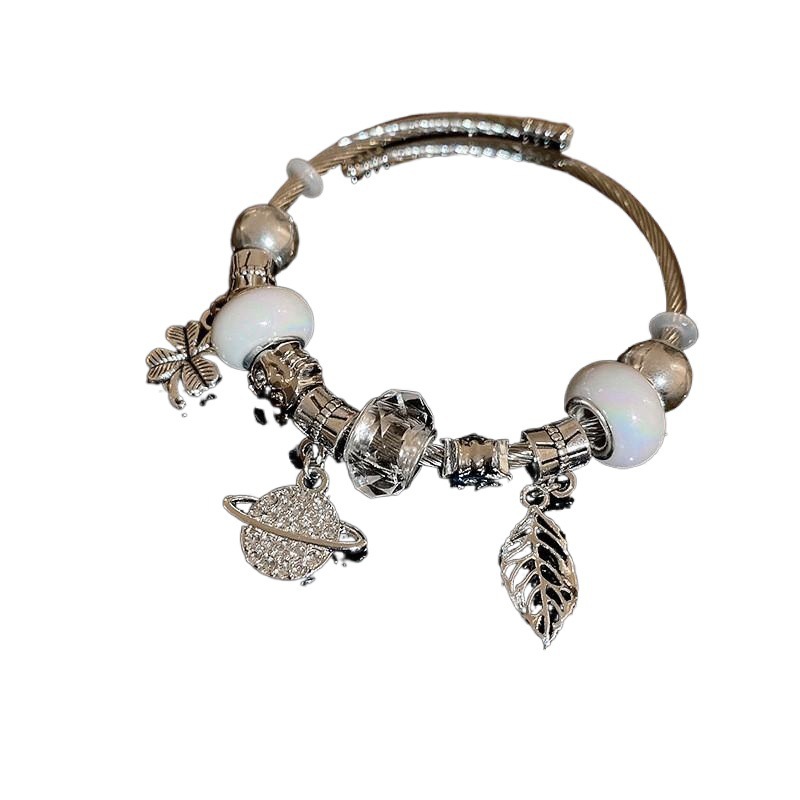 Nicho de la moda versátil pulsera de alto grado de lujo luz diseño personalizado pulsera de Saturno abierto de diamantes incrustado transfronterizo