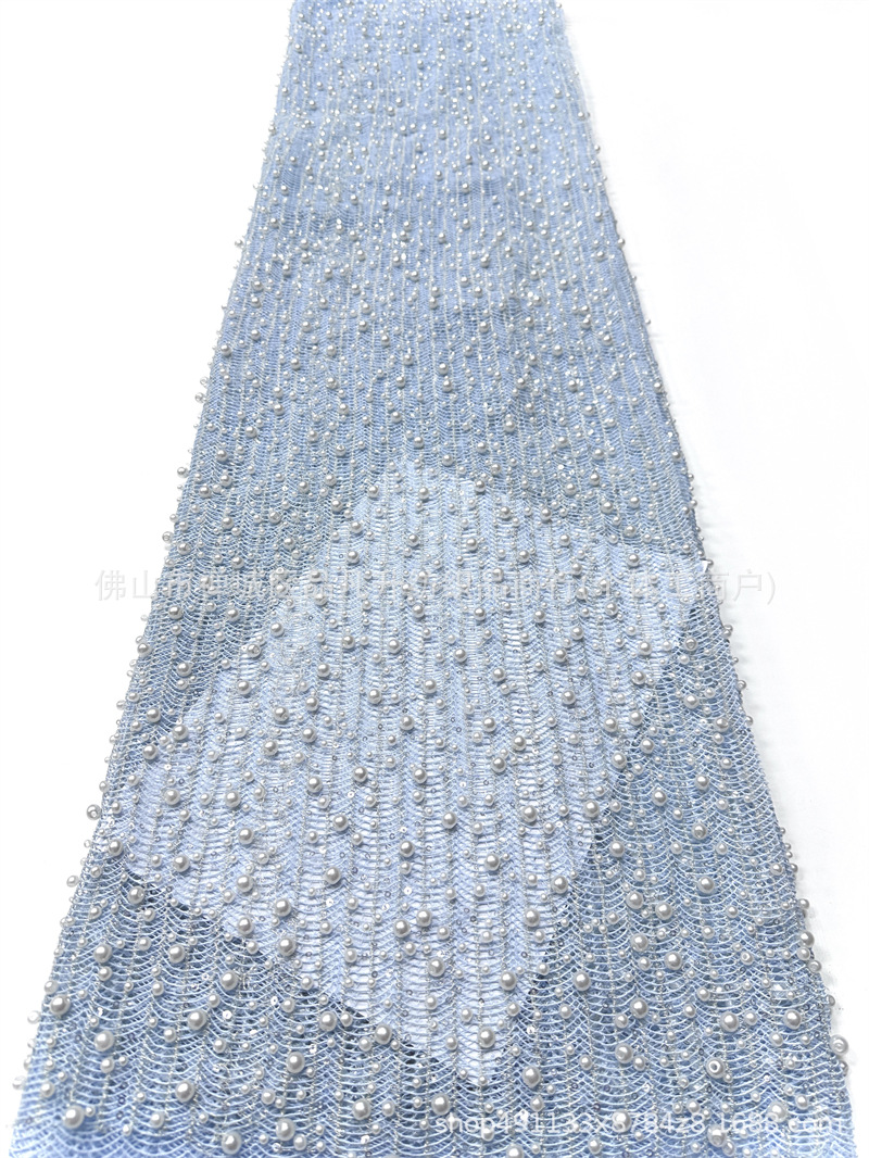 Tejido de malla de perlas hechas a mano de alto grado ondulado vertical tridimensional bordado de perlas vestido de boda tela de diseño