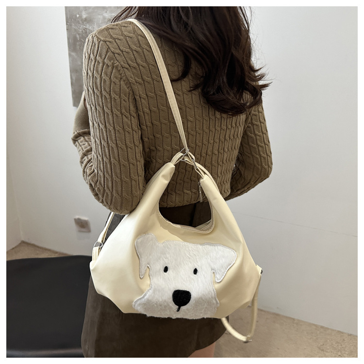 The new autumn and winter 2024 fashion cartoon backpack with simple, individual and niche design, single-shoulder bag and commuter tote bag undefined