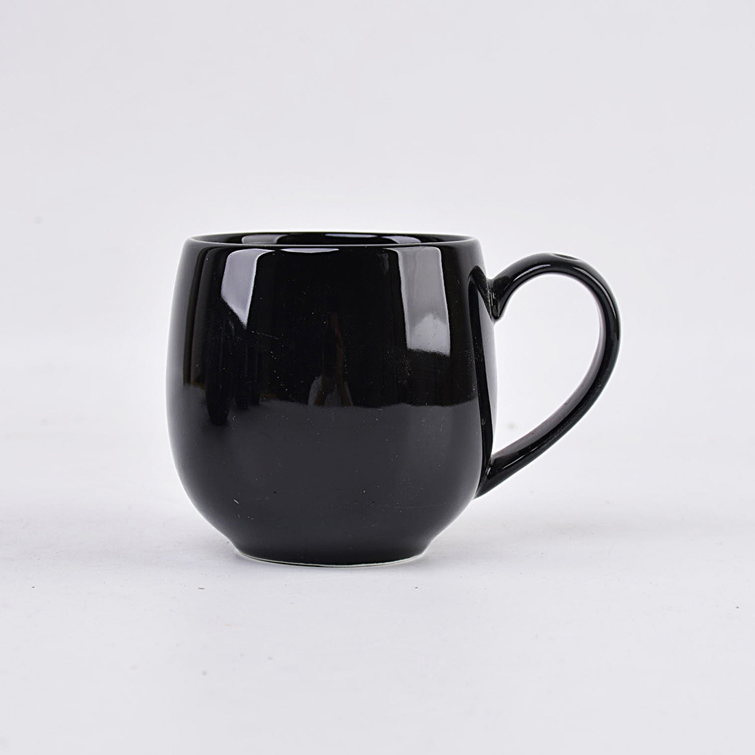 black A set of four six ceramic mugs for hot beverages