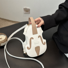 个性撞色手提包包女包2024新款秋冬时尚学院风小提琴单肩斜跨背包