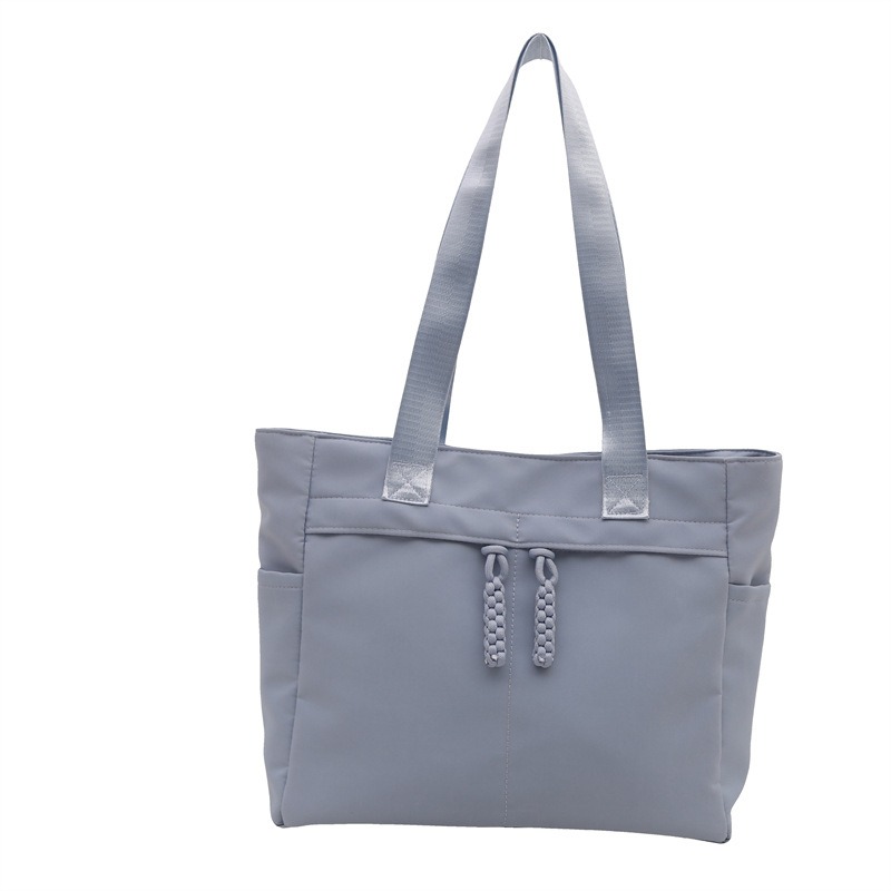 Bolsa japonesa para mujeres de gran capacidad de invierno 2024 nueva moda simple nicho bolso de hombro bolso de mano