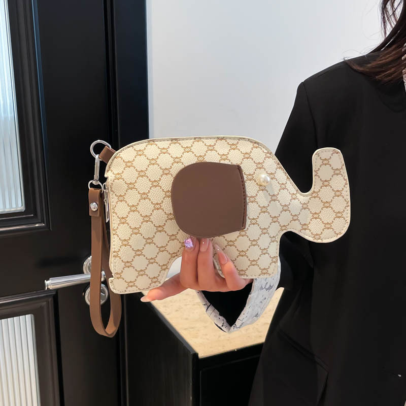 Elefante embrague mujer dibujos animados moda cena nuevo estilo retro personalidad verano exquisito 2025 bolso de mano