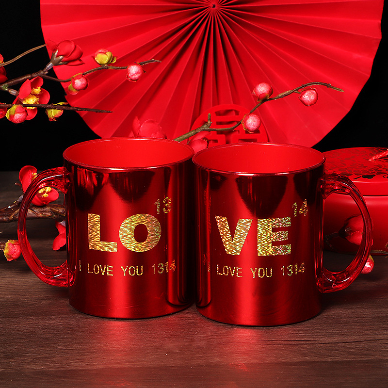 A pair of red wedding toothbrush cups for newlyweds, plastic, festive, toothbrush set for wedding and honeymoon