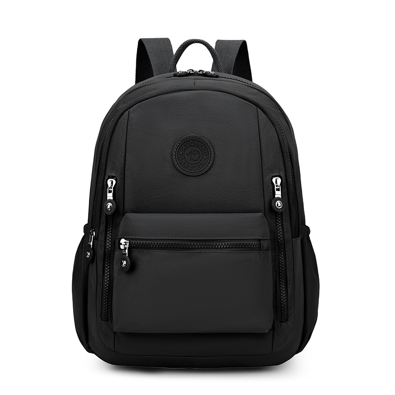 Mochila femenina 2025 nueva mochila de viaje de moda de gran capacidad, ligera tela de nylon casual y bolso de hombro