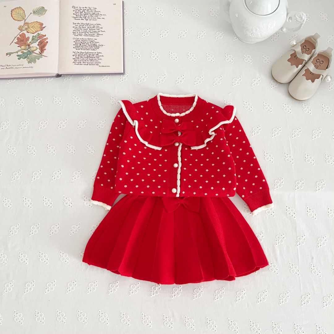 Flickor prickiga barnkläder med rosett och westernstil 2023 höst/vinter nytt koreanskt stickat set med två delar_voghion.com
