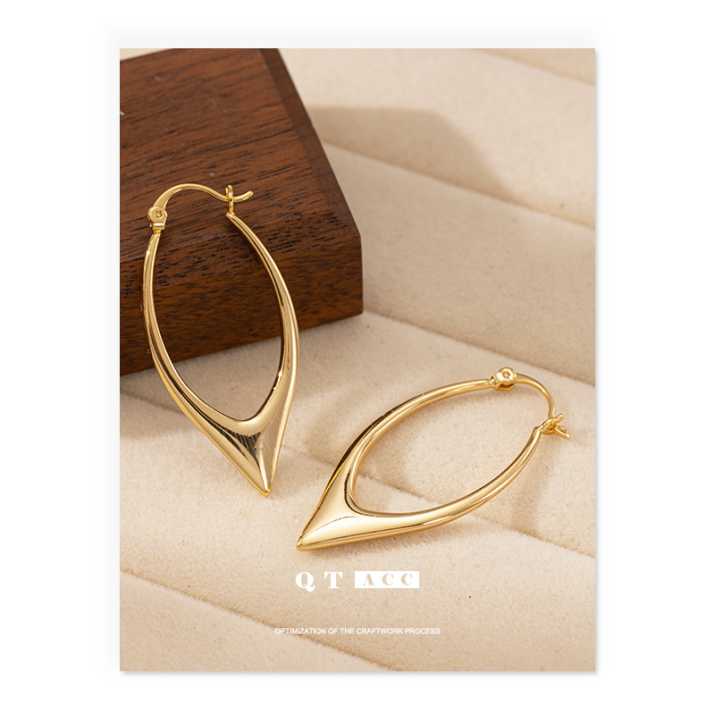 Moda europea y americana de moda fresca, perfiles de alta calidad, líneas laminadas de círculo, personalidad delicada y simple, pendientes de estilo de temperamento para mujeres